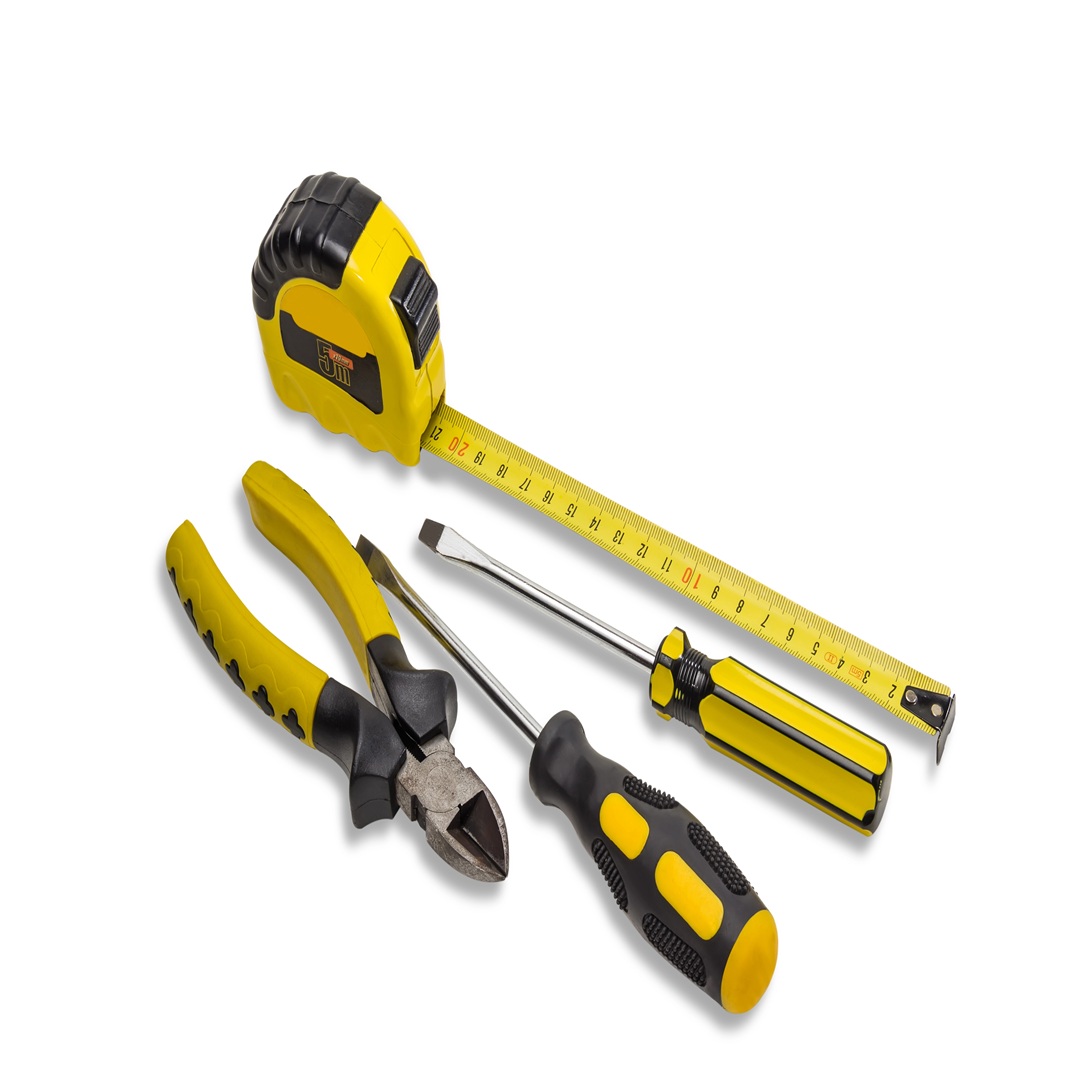 Verschiedene Werkzeuge und ein Maßband.