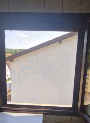 Fliegengitter für Holzfenster